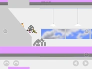 Landing on some grey bricks on the lower floor.