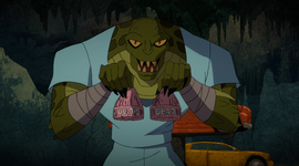 A crocodile-man hybrid holding two pink, knitted caps, with the words "God's Dead" written on them.