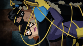 Batgirl and Nightwing tangled up