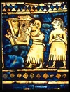Ur lyre.jpg (63 KB) 2600-2000 BCE - A man plays a bull-headed lyre at the banquet of a king. The lyre is supported by a strap across his shoulder. (Modern-day Iraq)