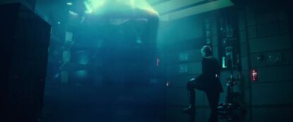 Esteban-kneels-before-the-Dragon-Lord-hologram