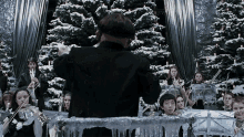 Flitwick coordenando a Orquestra no Baile de Inverno