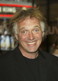 British actor Rik Mayall was cast as Peeves in the first film, but his scenes were ultimately cut