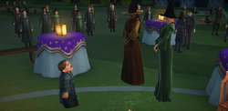 Flitwick speaking to Sinistra and McGonagall at concert HM
