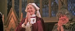 Madam Pomfrey and Professor Sprout clapping COSF