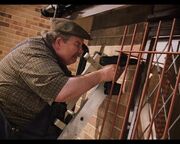 Vernon Dursley installs bars