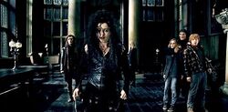  at Malfoy Manor with Fenrir Greyback (right) and Scabior (left)