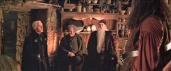 Hagrid's hut with visitors Malfoy Fudge Dumbledore