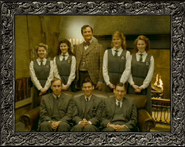 Slughorn, four girls and three boys