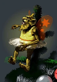 Een kabouter bovenop de kerstboom van de 