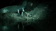 Harry i Dumbledore oświetlający jaskinię