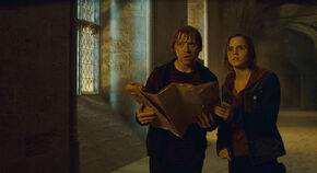 Ron-and-hermione-with-the-marauders-map-1050x0-c-default
