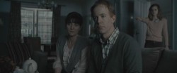 Hermione modifying her parents' memories.jpg