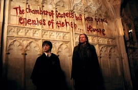 Harry-and-filch-by-the-bloodied-wall-1050x0-c-default