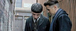 Credence and Grindelwald disguised as Graves