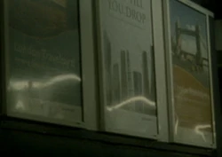 Travelcard ads (left and right) at 