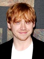 Rupert-grint-premiere-rise-of-the-planet-of-the-apes-01