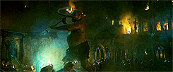 The trio escaping a giant at Battle of Hogwarts