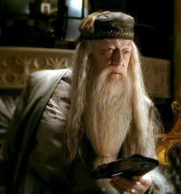 Dumbledore holding Tom Riddle's Diary 01