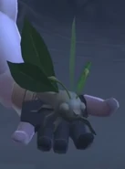 Torvus giving a carved Flitterby to Jacob's sibling as a gift