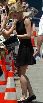Emma Watson signing autographs outside Grauman's Chinese Theatre in 2007