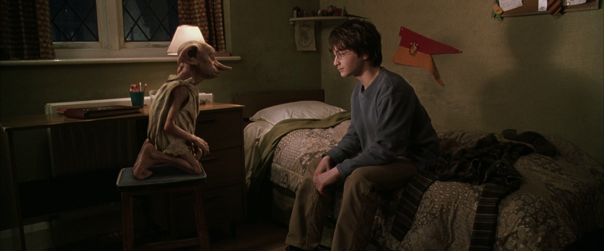 Dobby visits Harry's dormitory on Christmas morning – Harry Potter Lexicon