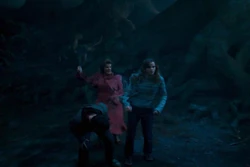 Umbridge using the Shield Charm to block an arrow in the  of 