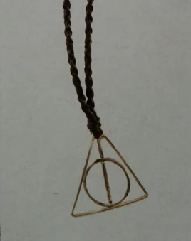 Grindelwald's Deathly Hallows necklace