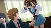 Haruhi blackmailing  of the  into giving her a computer.