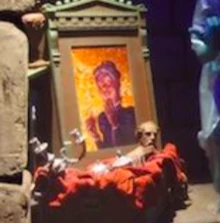 Maude's portrait alongside a bust of  in the Exit Crypt.