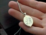 L. R. locket
