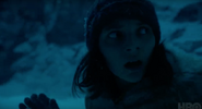 Dafne Keen in snow