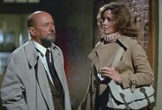 Doctor Loomis consults with Marion.