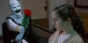 Art gives Casey a flower