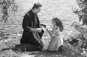 The Monster plays with little Maria