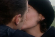 Mike and Jackie kiss in Testament