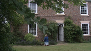 Meryl Johnson does her gardening as she hears a motorcycle approach