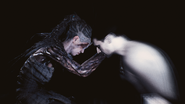 Dillion's visage appears as Senua holds his severed head.