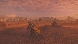 A Helldiver explores the outskirts of an urban settlement in Karlia