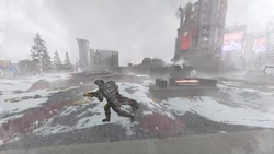A Helldiver surveys the ruins of an 