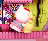 Kitty und Pompom umarmen sich umarmen sich