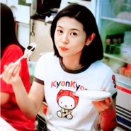Kyoko Koizumi wearing a Kyon-chan shirt.