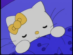 Mimmy sleeping in bed.png