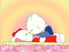 Daniel Starr, as the Prince, kissing Hello Kitty (as Snow White) to wake her up