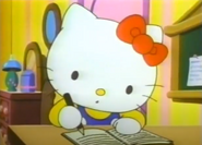 Kitty schreibt in ein Buch
