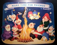 The Puros at a campfire with Tuxedo Sam, Kiki, and Lala