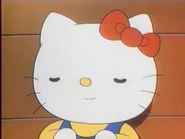 Hallo Kitty mit geschlossenen Augen und einem Lächeln