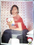 Kyoko Koizumi with a Kyon-chan doll.