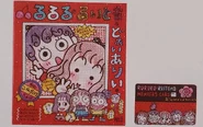 Two early pieces of Rururugakuen merch, which includes the aforementioned notebook where the characters first appeared