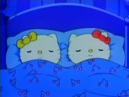 Hello Kitty and Mimmy sleeping again, only with smiles on their faces this time.